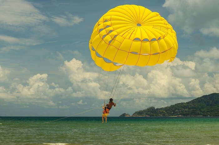 Parasailing over the blue waters of the Andaman Sea