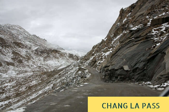 The slippery road amidst the snowclad mountains near Chang La Pass