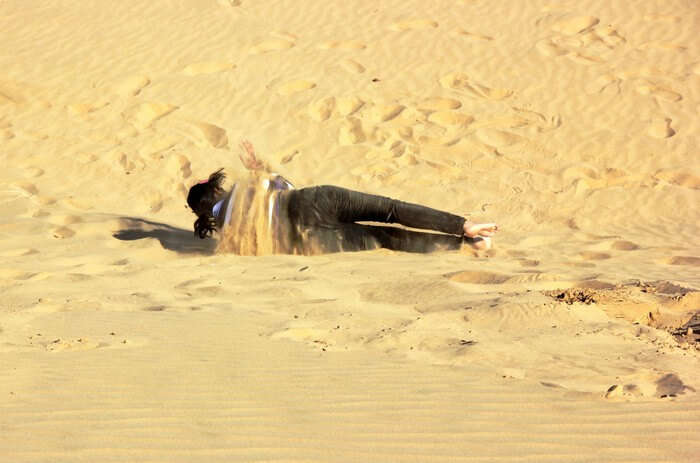 Swati rolling in Sam Sandunes, Jaisalmer