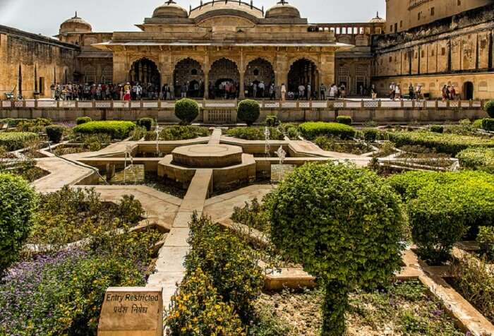 Tourists explore the popular Vidyadhar Garden near Jaipur