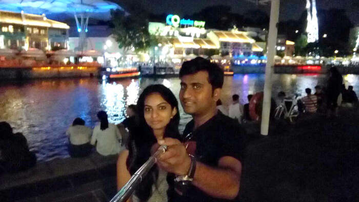 Pooja and her husband click a selfie in Singapore