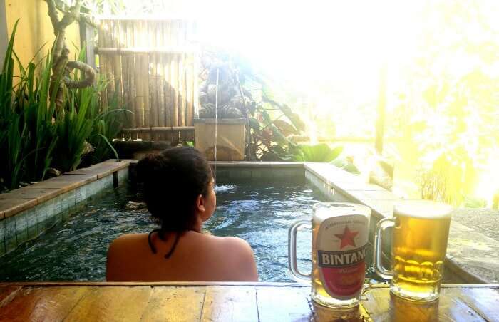 Ritika in the private pool of their room in Bali