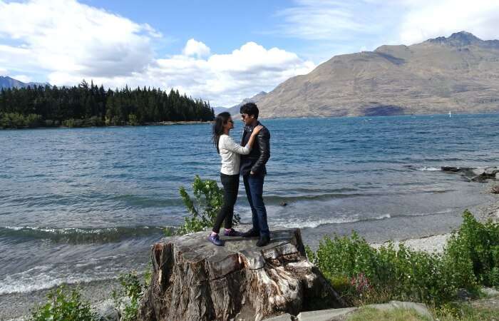 Vinamra and Ankita posing in the scenic background of Queenstown