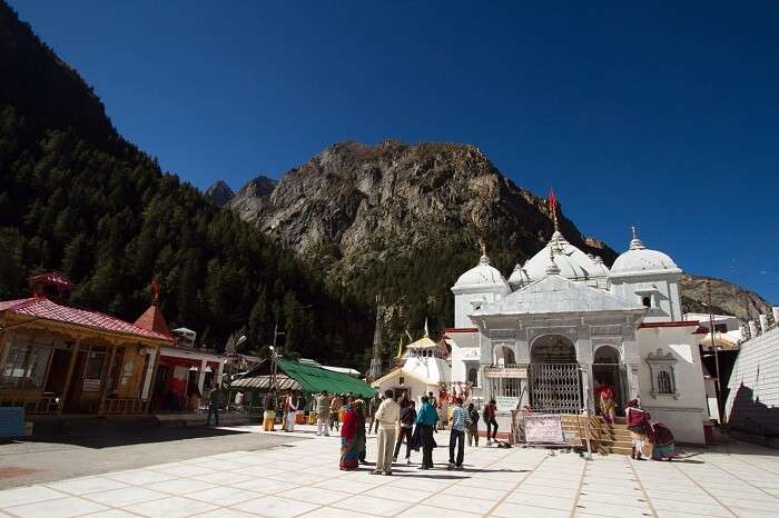 Pilgrims stop to offer prayers at the Gangotri Temple