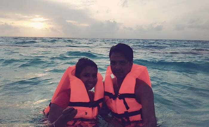 Badri and his wife swimming in Maldives