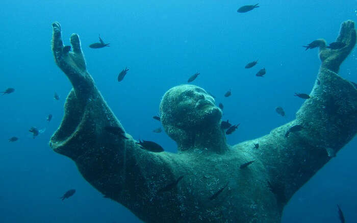 This 2.5 meter bronze statue is located off the coast of Portofino in Italy.