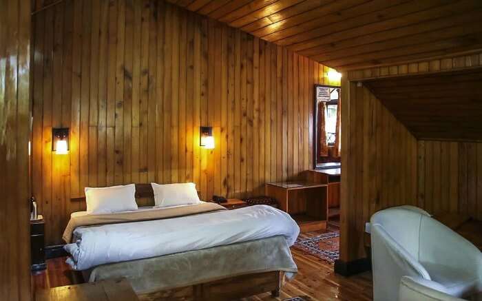 Wooden interiors of rooms in Gymkhana Resort