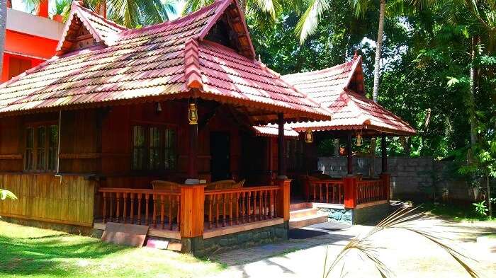 The thatch-roofed hut rooms of God’s Own Country Resort - One of the best Ayurveda resorts in Kovalam