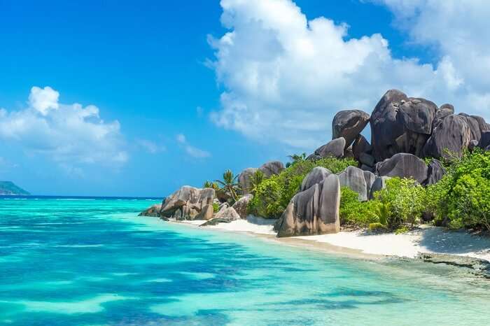 Granite rocks at beautiful beach on tropical island La Digue in Seychelles