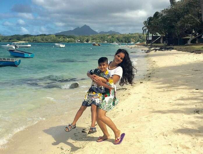 Raj Kumar and his family at the beach in Ile aux Cerfs Island