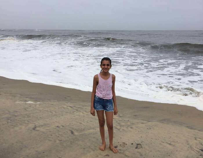 Ravi and the kids at the beach in Kerala