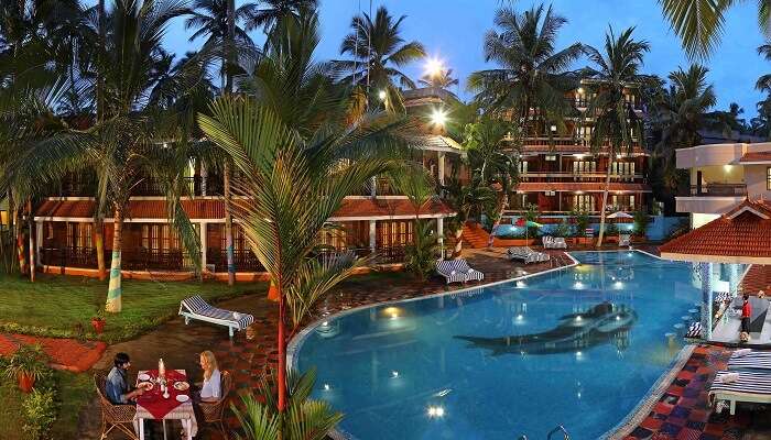 A soothing pool-side scene from Jasmine Palace Hotel - One of the best economy resorts in Kovalam