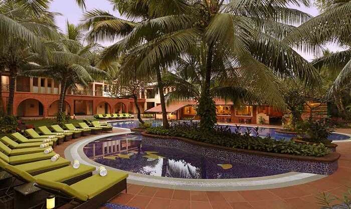 The poolside seating at the Lemon Tree Amarante Beach Resort