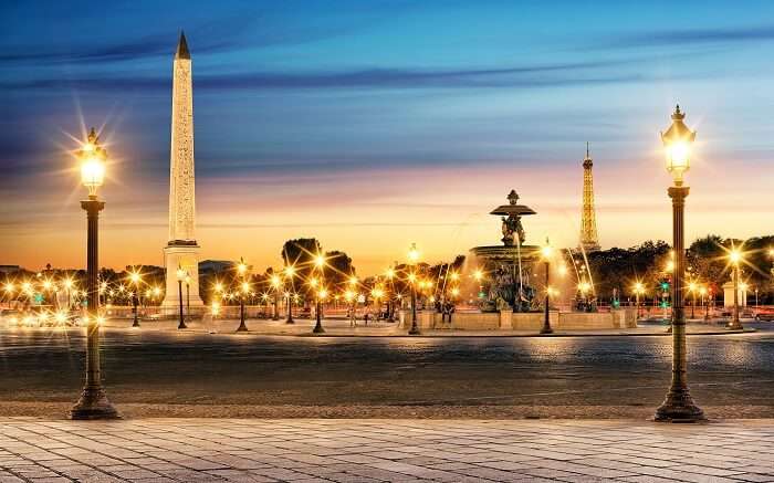 Shimmering lighting at the Palace de la Concorde in Paris during twilight