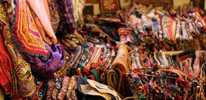 Textiles at display at Sadhna Emporium - one of the best shopping places in Udaipur