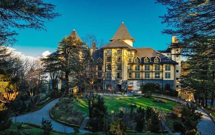 The opulent exterior of Wildflower Hall Resort in Shimla - one of the best luxury resorts in Himachal Pradesh