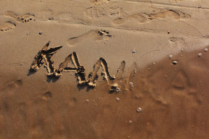 Kanikas name in the sand on a beach in Sri Lanka