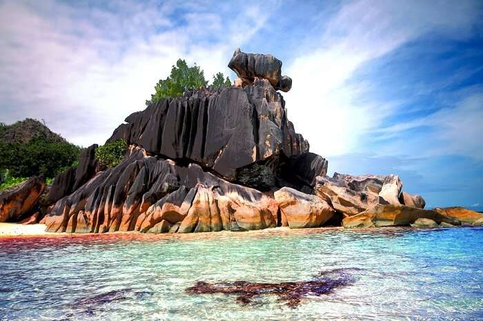 The large boulders and a beach on Cousine Island