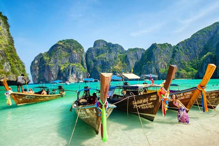 Tourists get ready for a ride of long tail boat in Phuket