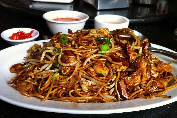 The popular Chinese Mine Frite dish being served with chutneys in Mauritius