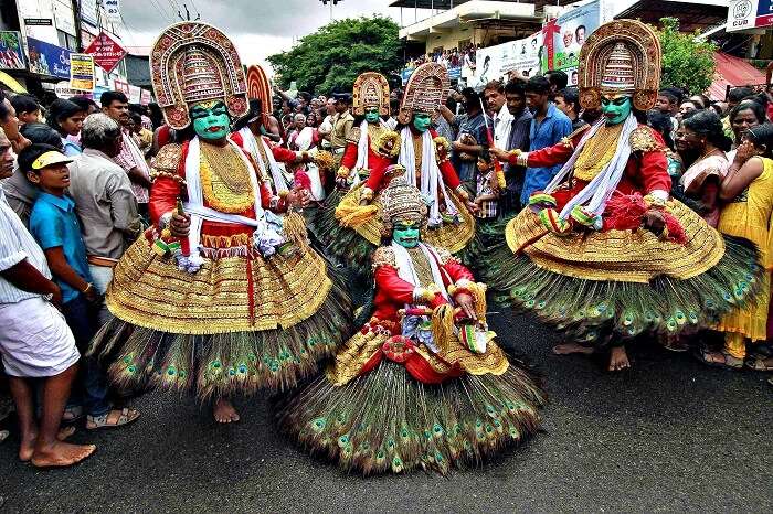 Dancers participate in festivities marking the start of the annual harvest festival of Onam in Kerala