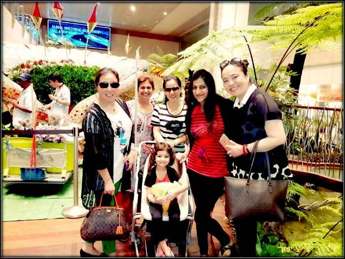 Srishti and her family at the Singapore airport