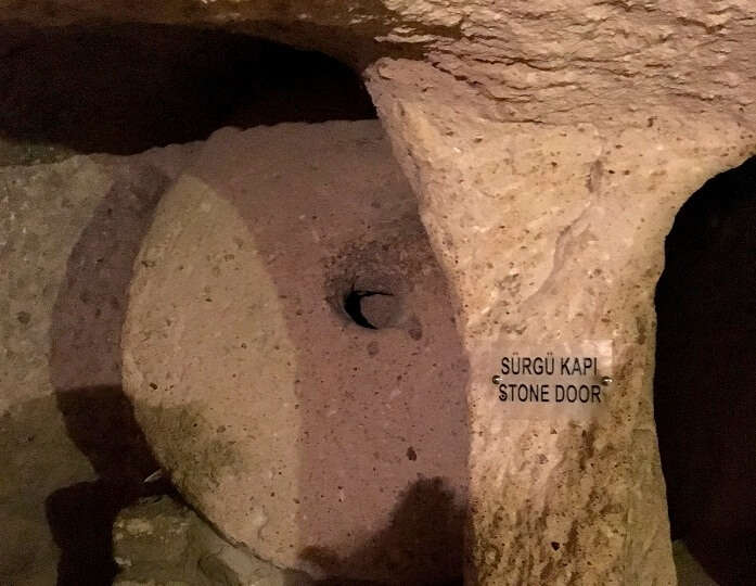 Stone door at the underground city in Turkey