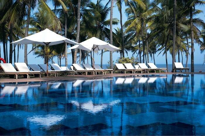 The poolside seating at the Vivanta By Taj - Fort Aguada - that is one of the luxury resorts in Goa