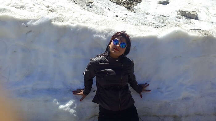 Vishals wife surrounded by snow in Khardungla Pass