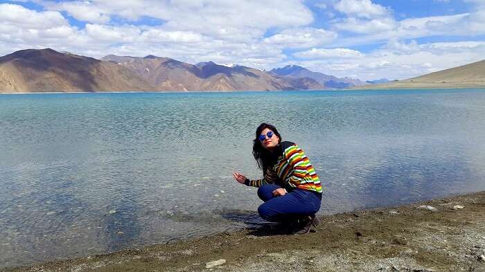 Vishals wife at the Pangong lake in Ladakh