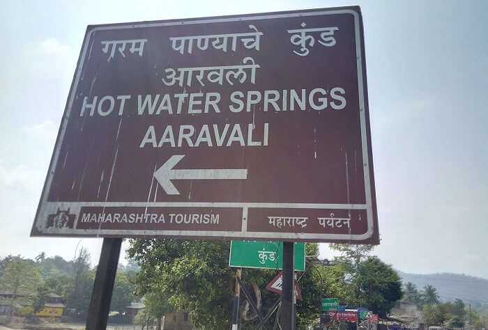 A sign board near famous Aravali hot springs in Maharashtra