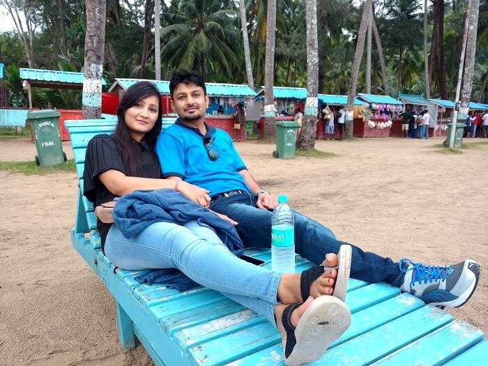 Vivek and his wife on a beach