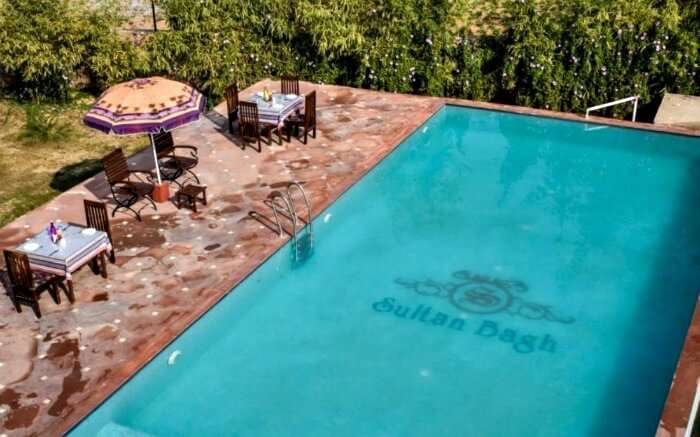 Pool side table at Sultan Bagh Resort 