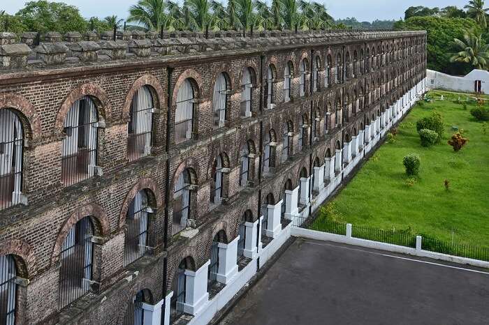 An aerial shot of the lawn and the jail building at the Cellular Jail in Port Blair