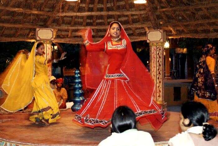 Visitors being treated to a lively folk dance at Chokhi Dhani