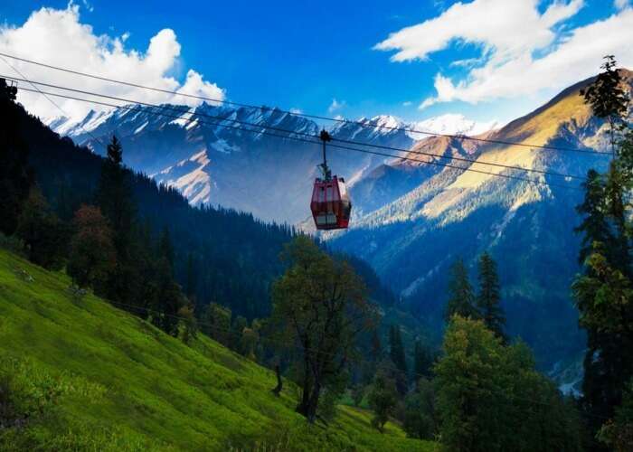 Enjoy the stunning snow capped vistas of Manali on a Gondola Ride