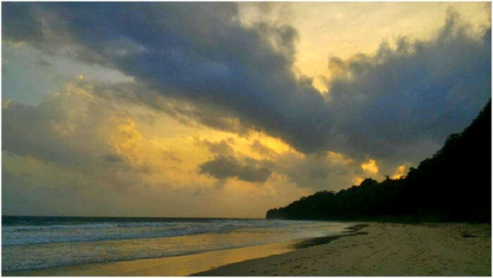 Lighthouse beach sunset and clouds