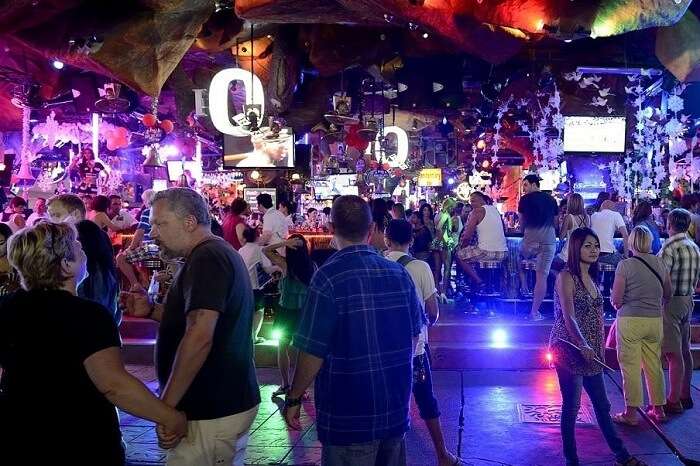 Tourists and locals enjoy the nightlife in Phuket at one of the nightclubs