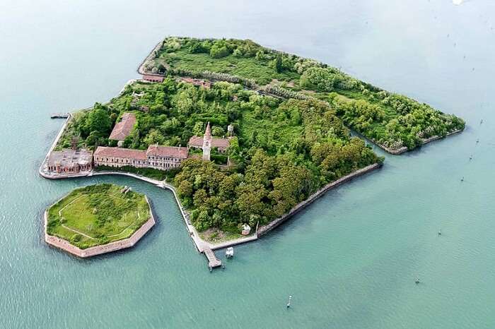 Bird eye view of the abandoned Poveglia Island in Italy