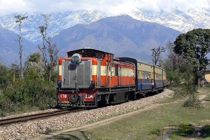 Dhauladhar Ranges in the backdrop of Kangra Valley Toy Train