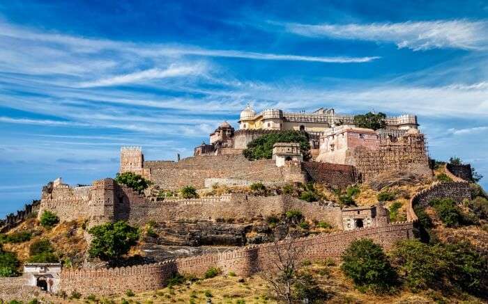 Kumbhalgarh Fort with its fortified walls proudly dominates the landscape of the city