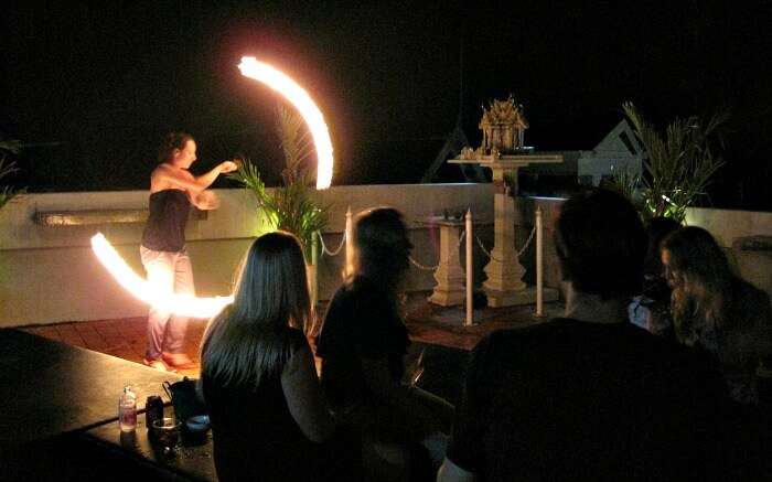 A fire dancer displays her skills at the Rooftop Bar in Krabi