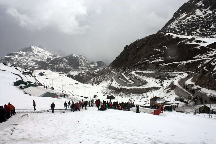 Tourists walking down towards the Indo-China border at Nathula Pass