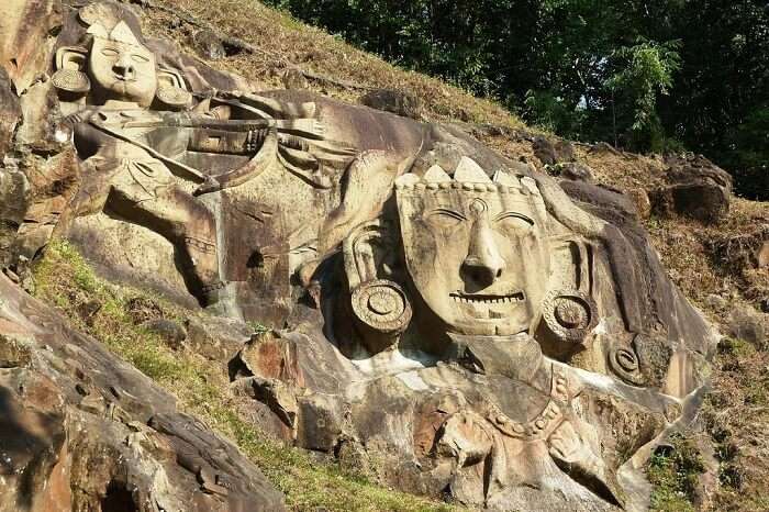 The rock carvings at Unakoti that are believed to belong to 1 crore gods and goddesses who once accompanied Lord Shiva