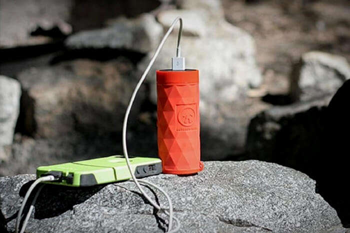 Bluetooth speaker cum flashlight that plays music and charging phone at the same time