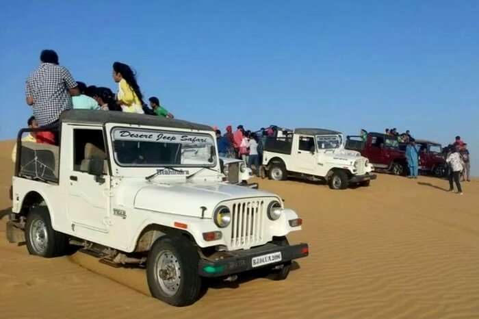 Visitors enjoying jeep safari in Jaisalmer