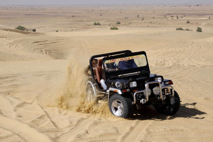 Tourists taking a jeep safari in Jaisalmer