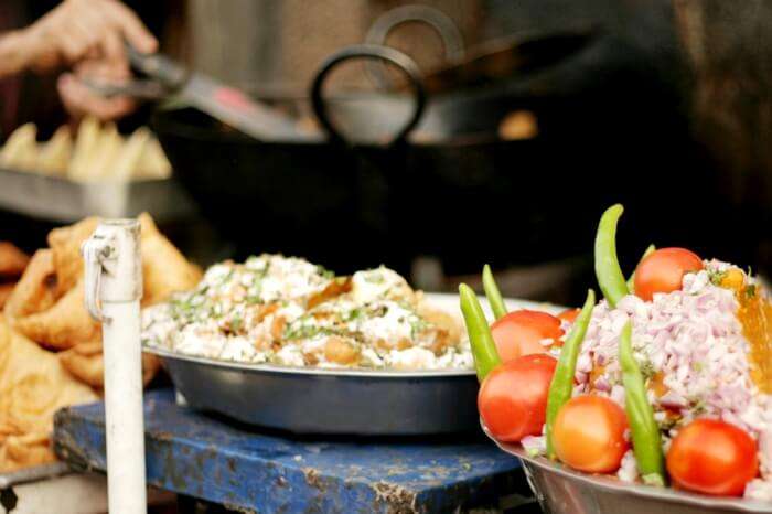 Roadside stall selling samosa and chaat in a marketplace in Hyderabad