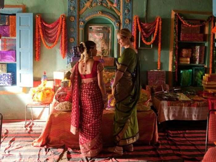 scene from Eat Pray Love with Julia in saree with Indian woman