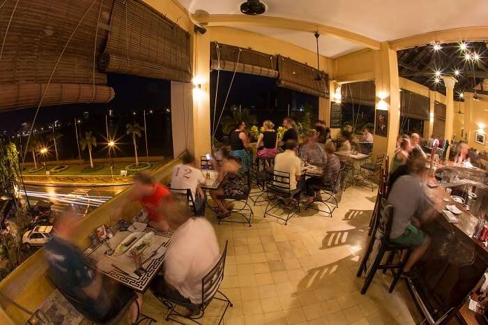 Guests dining at the FCC restaurant at Phnom Penh that is said to be the center of the Cambodia nightlife
